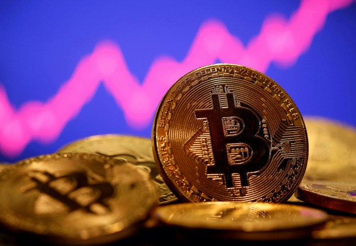 Bitcoin surging toward $60,000