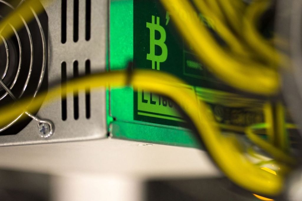 International Finance: Bitcoin Jumps Past $67,000 Level for First Time to Record High