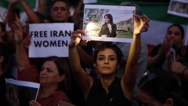 Clashes, global protests flare over death of Iranian woman Mahsa Amini