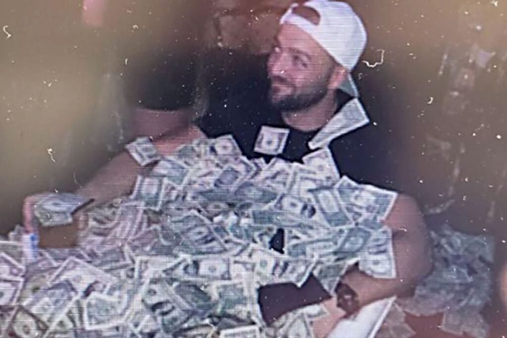 Ohio Man Who Posed in Tub Full of Cash to Plead Guilty in Bitcoin Theft Case