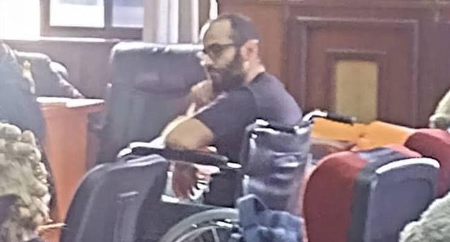 Binance executive’s health worsens, appears in court in wheelchair